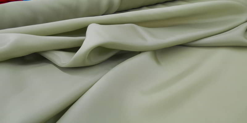 https://cdn.textileschool.com/wp-content/uploads/2011/12/rayon-fabric.jpg